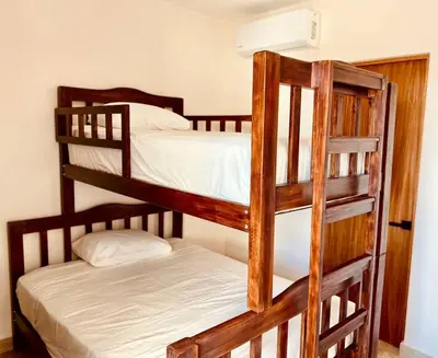 Cama o camas de una habitación en Dpto C-alberca Playa La Bamba - Facturamos