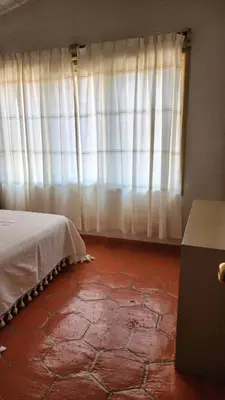 Cama o camas de una habitación en Bungalow del trotamundos