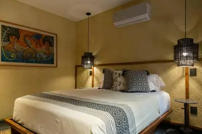 Cama o camas de una habitación en Casa Rufina Oaxaca Centro - Adults Only