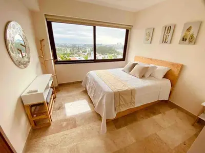 Cama o camas de una habitación en 9nopiso Vista al Mar con 3 Albercas con Gym y Playa