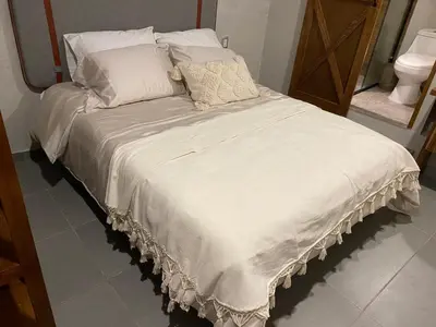 Cama o camas de una habitación en Layoo, Tu Casa en Oaxca 105