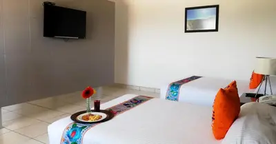 Cama o camas de una habitación en Chiapas Hotel Express, Tuxtla Gutierrez