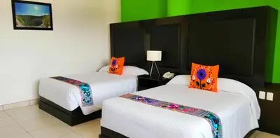 Cama o camas de una habitación en Chiapas Hotel Express, Tuxtla Gutierrez