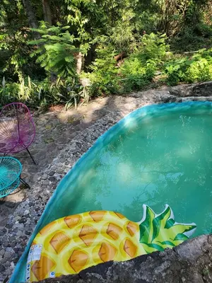 Piscina en o cerca de Glamp de Lujo Teques Granja El Sol