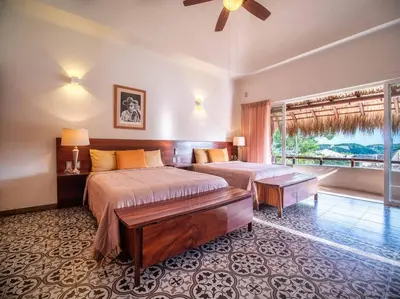 Cama o camas de una habitación en Casa Maka - Stunning Oceanfront Villa