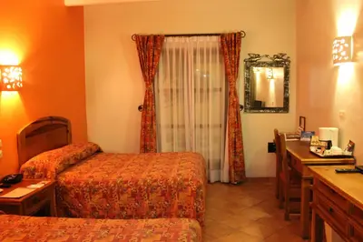 Cama o camas de una habitación en Hotel Casa Conzatti