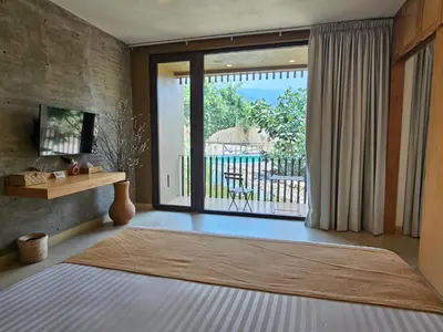 Cama o camas de una habitación en Xolatlaco Tepoztlán Hotel Boutique