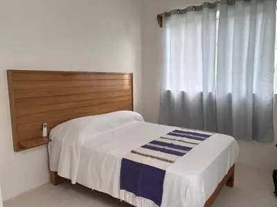Cama o camas de una habitación en Casa Maya, tu escape con alberca privada