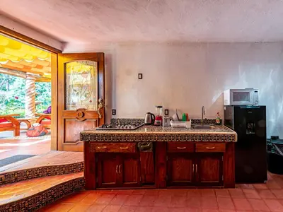 Una cocina o zona de cocina en Cabañas Elsa María, Cabañas para Hospedaje con Alberca y Jardín de Eventos