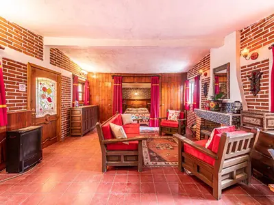 Zona de estar de Cabañas Elsa María, Cabañas para Hospedaje con Alberca y Jardín de Eventos