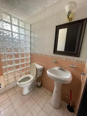 Un baño de Costera, depa hasta 9 personas con vista al mar, alberca, terraza y aire acondicionado