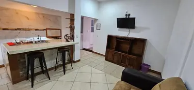 Una cocina o zona de cocina en Depa Púrpura Caracol