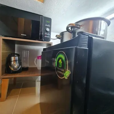 Una cocina o zona de cocina en Depa Púrpura Caracol