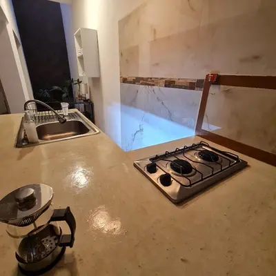 Una cocina o zona de cocina en Depa Púrpura Caracol