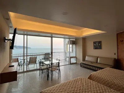 Zona de estar de Torres Gemelas Suite VIP Frontal 607