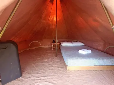 Cama o camas de una habitación en Glamping Campamento Cuetzalan