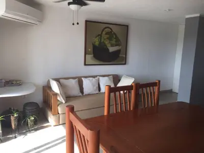 Zona de estar de Cómodo departamento en Costa Azul.