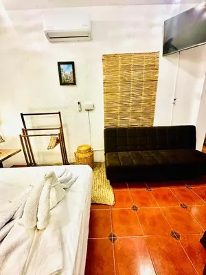 Cama o camas de una habitación en La Casa de Colores Ocean View