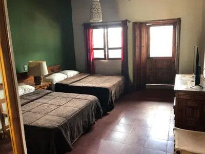 Cama o camas de una habitación en Casona Colonial de la Misión