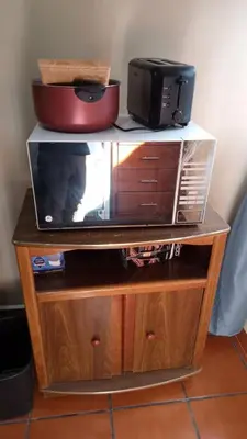 Una televisión o centro de entretenimiento en COYOACAN ALCALDIA CERCA DE LA UNAM GUEST House AMATL
