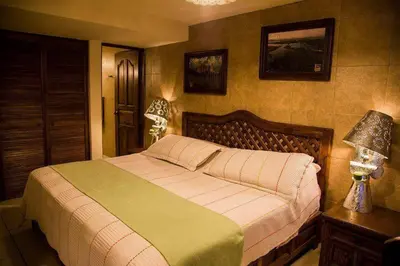 Cama o camas de una habitación en Hotel Casa Yunenisa