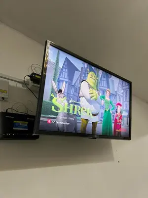 Una televisión o centro de entretenimiento en Hospedaje 