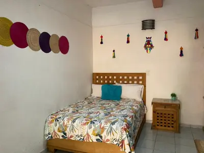 Cama o camas de una habitación en Cómoda y amplia Habitación en Jalatlaco