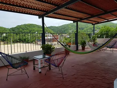 Un balcón o terraza de Hostal Azul y Blanco