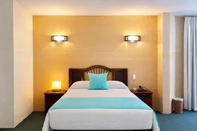 Cama o camas de una habitación en Hotel Alifer