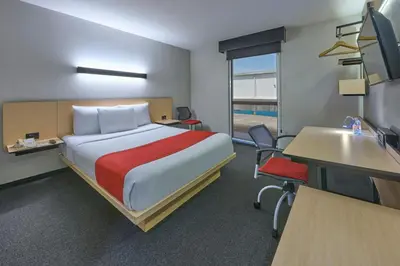 Cama o camas de una habitación en City Express by Marriott Ciudad de México Plaza Central