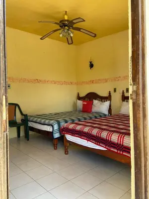 Cama o camas de una habitación en Rancho Hotel El Carmen