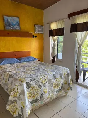 Cama o camas de una habitación en La Cabaña del Lago