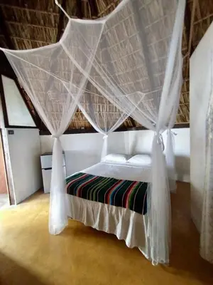 Cama o camas de una habitación en CAFE MAYA
