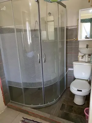 Un baño de Habitación privada Leonera