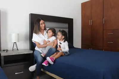 Cama o camas de una habitación en Suites Independencia Oaxaca