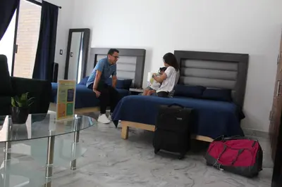 Zona de estar de Suites Independencia Oaxaca