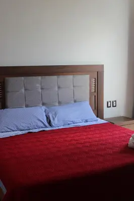 Cama o camas de una habitación en Suites Independencia Oaxaca
