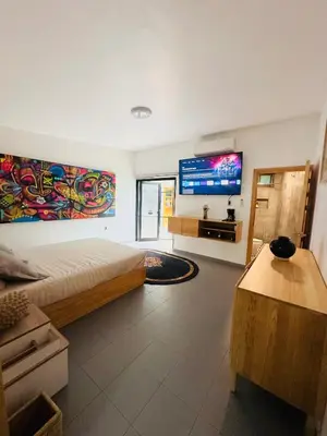 Cama o camas de una habitación en Departamento Mosso