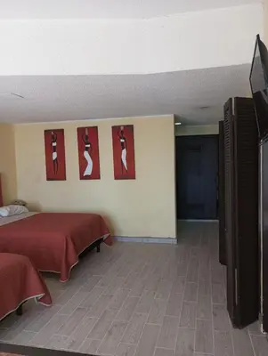 Cama o camas de una habitación en Departamento con hermosa vista al mar y acceso a playa, 2 albercas