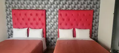 Cama o camas de una habitación en HOTEL MAQUIAVELO SOLO ADULTOS