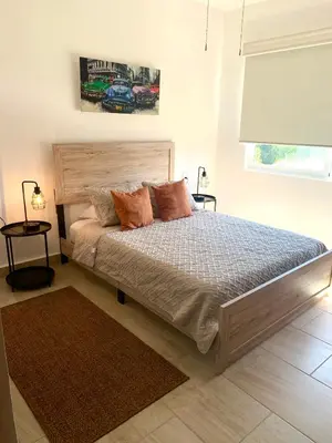 Cama o camas de una habitación en Departamento de Lujo & Club de Playa