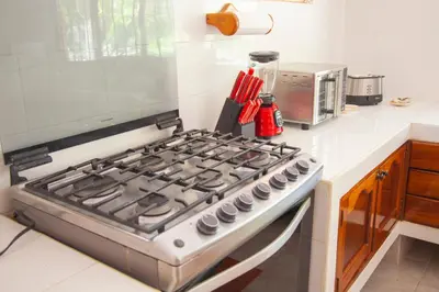 Una cocina o zona de cocina en Hotel Casa Rush