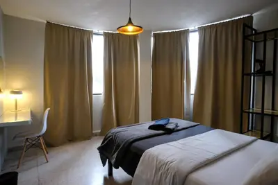 Cama o camas de una habitación en Comfortable One Bedroom Apartment Casa Icacos # 0