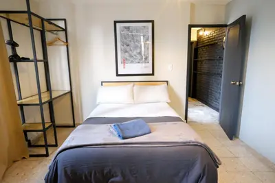 Cama o camas de una habitación en Comfortable One Bedroom Apartment Casa Icacos # 0