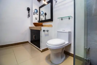 Un baño de Collection O Hotel Mango,Six Flags Hurricane Harbor Oaxtepec