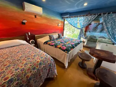 Cama o camas de una habitación en Beachfront Paradise Boutique Hotel - Alebrijes Jacuzzi Villa