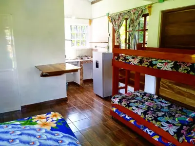 Cama o camas de una habitación en Quinta con alberca