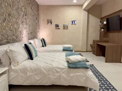 Cama o camas de una habitación en Loft Mueganos III en Val´Quirico