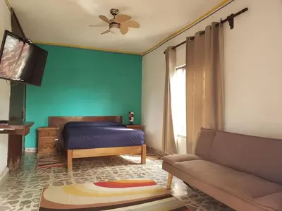 Una televisión o centro de entretenimiento en Casa Temazcal Cuernavaca - Con Alberca y Temazcal
