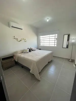 Cama o camas de una habitación en Increíble Casa con alberca y club de playa